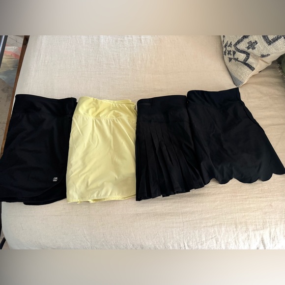 LOT (4) Women’s Tennis/Golf Skirts Size XL Black & Pale Yellow Athletic EEUC! - Picture 1 of 13